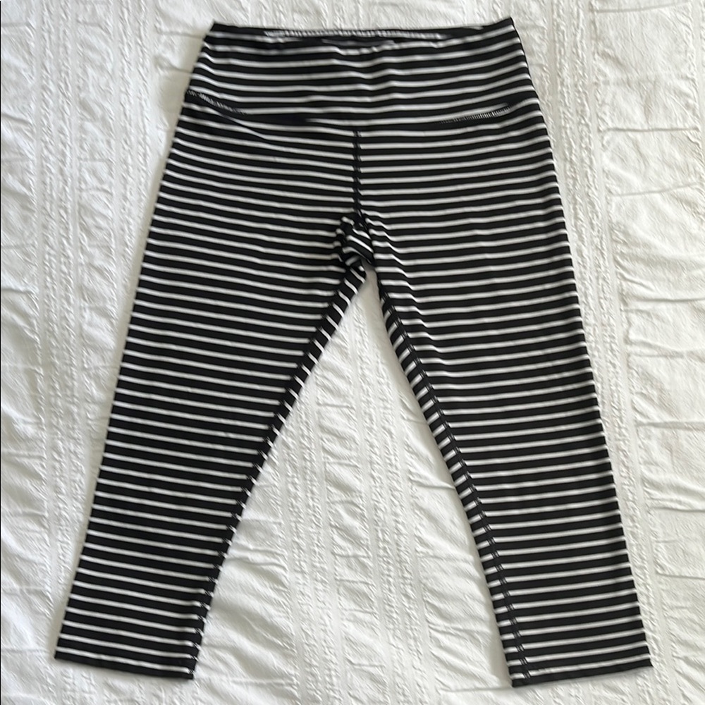 Scorpio Sol Black and White Striped Leggings
